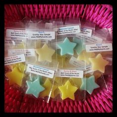 five star shaped soaps in plastic bags on a red wicker basket with labels