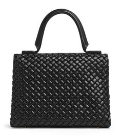 Find BOTTEGA VENETA Intrecciato Patti Top-handle Bag on Editorialist. The Bottega Veneta Patti top-handle bag features a folded-over top and padded intrecciato weave. The bag is hand-carried by its top handle. Designer Bags With Braided Handles And Top Handle, Designer Bags With Top Handle And Braided Handles, Designer Evening Bags With Round Handle, Luxury Satchel With Braided Round Handles, Top Handle Satchel For Shopping, Office Bags With Braided Top Handles, Office Bags With Top Handle And Braided Handles, Office Bag With Braided Top Handle, Luxury Handheld Satchel With Braided Handles