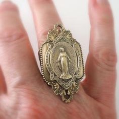 Vintage Jewelry Vintage Ring Virgin Mary Ring Brass Ring | Etsy Nickel-free Heirloom Jewelry For Anniversary, Distinctive Brass Jewelry For Anniversary, Handmade Bronze Rings For Collectors, Anniversary Bronze Metal Ring Jewelry, Unique Brass Jewelry For Anniversary, Heirloom Nickel-free Jewelry For Anniversary, Vintage Adjustable Rings For Gifts, Vintage Adjustable Rings For Gift, Handmade Bronze Anniversary Rings