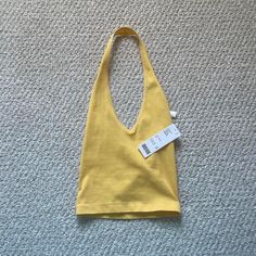 Reposhing This Item I Purchased By Accident (Not My Size) But Felt Bad I Didn’t Want To Cancel So Now Just Trying To Make My Money Back On It Solid V-neck Halter Top For Summer, Summer Seamless V-neck Halter Top, Chic Yellow Halter Top For Summer, Summer Triangle Top Tank, Spring Seamless V-neck Halter Top, Seamless V-neck Halter Top For Spring, Yellow Triangle Top For Spring, Urban Outfitters Seamless Summer Crop Top, Urban Outfitters Seamless Crop Top For Summer