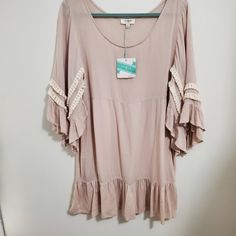 Umgee Nwt Summery Dress. Tassels On Sleeves. Slightly Sheer. Darted. No Flaws Or Stains. Size Medium 30 Long 20 Pit To Pit Summer Dress With Ruffle Hem And 3/4 Sleeves, Summer Dresses With Ruffle Hem And 3/4 Sleeves, Beige 3/4 Sleeve Dress For Beach, Bohemian Beige Half Sleeve Dress, Spring Bohemian Mini Dress With 3/4 Sleeves, Beige 3/4 Sleeve Dress For Vacation, Flowy Half Sleeve Dress For Day Out, Summer Ruffle Hem Half Sleeve Dresses, Beige Bell Sleeve Dress