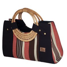 If you love elegant and classy handbags and love making a statement then this bag is for you! With sturdy and gorgeous cane handles and a stunning combination of colors from the Fugu fabric, the bag is practically royalty. The Fugu or Smock fabric is a luxury native fabric worn mostly by the royals of the Northern Tribes of Ghana. This bag also comes with an inner pocket with a zip fastening and provides lots of space, it's even big enough for a small laptop! As if that was not awesome enough, when you purchase a bag from this Mo Tribe collection, you contribute towards empowering a woman from the low-income weaving community in Accra, Ghana where these bags are made. Bonus fun fact: the word "nhava" means bag in Shona. Grab yours now! Details: Cane Handle Length 15” x Height 10.5” x Depth Native Fabric, Classy Handbags, Accra Ghana, Cane Handles, Small Laptop, The Royals, Low Income, Tote Handbag, Fun Fact