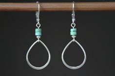 Genuine Turquoise Sterling Silver Earrings Dangle Earrings Drop Earrings Hoop Earrings Teardrop Earrings Gift for women These lovely dangle earrings are made of a sterling silver teardrop with some genuine Turquoise stones on the top. The ear wires are in sterling silver as well. Finish : Bright sterling silver Teardrop hoop and sterling silver findings ( spacer beads and eye pins ). Color : Genuine turquoise beads Length : 1 3/4 inches including the Sterling Silver lever back Ear wire : Sterlin Nickel-free Turquoise Teardrop Hoop Earrings, Nickel-free Teardrop Turquoise Hoop Earrings, Turquoise Teardrop Hoop Earrings Nickel Free, Teardrop Turquoise Nickel-free Hoop Earrings, Turquoise Teardrop Nickel-free Hoop Earrings, Minimalist Turquoise Teardrop Earrings, Metal Pendant Necklace, Small Dangle Earrings, Silver Turquoise Earrings