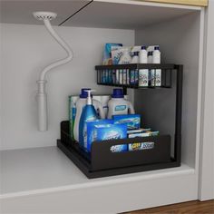 a bathroom shelf filled with toiletries and hygiene products