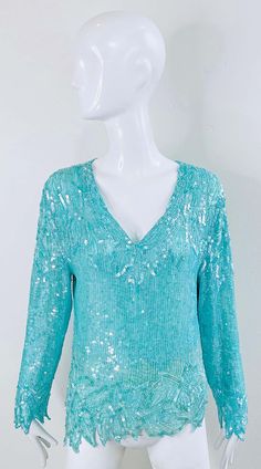 For Sale on 1stDibs - Beautiful late 80s SWEE LO turquoise blue silk chiffon sequin and beaded long sleeve top ! Features thousands of hand-sewn iridescent sequin and beads 80s Blouse, Iridescent Sequin, Late 80s, Sequin Beading, Blue Silk, Silk Chiffon, Turquoise Blue, Vintage Finds, Hand Sewn