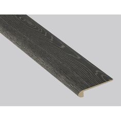 an image of a wooden flooring board with grey woodgrain and white trim