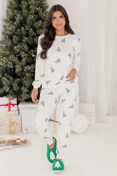 Details Cream Christmas tree print pajama top Fabric has stretch, lightweight, relaxed bust Long sleeves with a crew neckline Pair this cute top with the matching pajama pants Unlined Size small from shoulder to hem 21.5" Material and Care 95% modal, 5% spandex Hand wash, dry flat Patterns may vary Materials may have natural variations Colors may vary from different viewing devices. Best Friend Christmas Pajamas, Cute Christmas Pjs For Women, Cute Christmas Pjs For Family, Best Christmas Pajamas, Neutral Christmas Pajamas, Cozy Christmas Pajamas, Preppy Christmas Pajamas, Christmas Pajama Photo Shoot Family, Cozy Pjs Aesthetic