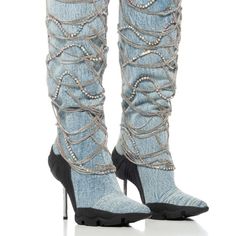 The Azalea Wang" Chained Icon " Chain Embellished Boot In Denim Is Made From A Soft Suede Upper And Features A Pointed Toe Silhouette, A Knee-High Shaft, Cascading Rhinestone And Chain Link Detailing, And A Metallic Stiletto Heel. Complete With A Textured Sole And A Back Zipper Closure. - Suede Upper - Pointed Toe - Stiletto Heel - 14.75” Shaft Height - 17” Shaft Circumference - 3.25” Heel Height Diy Denim, Denim Heels, African Lace Dresses, Azalea Wang, High Fashion Outfits, Leopard Fashion, Denim Crafts, Trending Boots, Country Concert