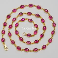 Thank you for coming in! Spectacularly beautiful solid gold gemstone chain necklace with smooth oval rubellite pink tourmaline bezels. Such beautiful color in gem grade! 20 inch with 14k solid gold lobster clasp! 64.35 carats! You'll get the necklace you see! DIMENSION of tourmaline bezels: Appr. 5.5mmx7.5mm MATERIAL: 14K Solid Yellow Gold, tourmaline. Yellow Gold Gemstone Oval Link Necklace, Formal Yellow Gold Tourmaline Necklaces, Luxury Oval Tourmaline Necklace, Gold Oval Tourmaline Necklace, Elegant Tourmaline Yellow Gold Necklace, Rubellite Tourmaline, Station Necklace, Fashion Jewelry Necklaces, Wow Products