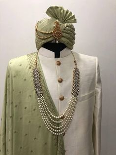 Drop Any sort of personalization requests for the embroidery, shawl,turban,neckpeice(mala) The set includes all the items represented in the photo 1) Sherwani 2)Churidars bottoms 3)Neckpeice 4)Shawl If the client is looking for matching shoes we can do that as well(Shoes/Juttis Will Be charged additionally, i.e They are not included in this price) Embroidered Kundan Sherwani For Wedding, White Kundan Elegant Sherwani, Elegant White Kundan Sherwani, Elegant White Sherwani With Kundan, Resham Embroidered Kundan Sherwani For Wedding, Wedding Sherwani With Resham Embroidery And Kundan Material, Traditional Cutdana Sets For Groom, Traditional Cutdana Sets For Grooms, Kundan Sherwani With Traditional Drape For Wedding