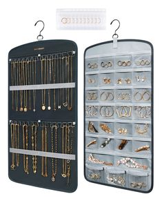 two large jewelry racks with hanging hooks and earring holders