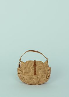 Sans Arcidet's Sam Mini Bag is crafted of natural crocheted raffia and features a tab closure, exterior pockets and a detachable faux leather shoulder strap. Measures approximately 7" x 3" x 6". Color tea. 100% raffia. Lining 100% cotton. Handle 88% polyurethane, 8% polyester, 2% cotton, 2% leather. Made in Madagascar. Spring Crochet Crossbody Bag With Braided Handles, Natural Straw Bag With Detachable Strap For Daily Use, Natural Straw Satchel With Removable Pouch, Natural Straw Satchel Bag With Removable Pouch, Natural Straw Satchel Bag With Detachable Strap, Natural Straw Shoulder Bag With Removable Pouch, Natural Satchel Straw Bag With Detachable Strap, Natural Straw Shoulder Bag With Detachable Strap, Natural Straw Bag With Detachable Strap For Spring