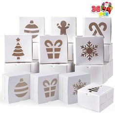 several boxes with different designs on them and one has a christmas ornament in the middle