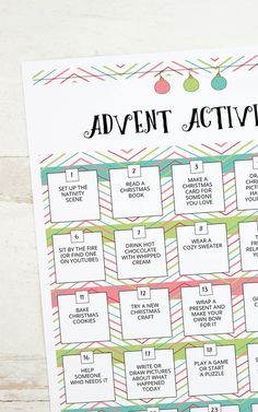 the printable christmas activity calendar is shown on a white surface with red, green and blue ornaments