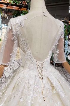 the back of a wedding dress on display