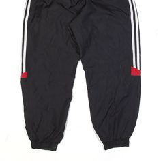 Item is in good used condition. > Size: XL > Waist Size (Un-Stretched): 22" > Inside Leg: 24" > Rise: 12" > Hem: 12" Urban Black Bottoms For Jogging, Black Three Stripes Bottoms For Streetwear, 90s Style Black Sports Pants, Black Training Pants With Three Stripes Branding, Black Sports Pants With Three Stripes, Black Bottoms With Adidas Three Stripes For Streetwear, Black Streetwear Bottoms With Three Stripes Branding, Sporty Black Bottoms With Adidas Three Stripes, Sporty Black Bottoms With Three Stripes Branding