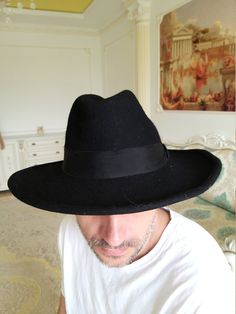 mens Hat mens Fedora Hat black Pillbox Hats Felt Hat vintage black Hat formal hats women Hat Classic Hat retro hat wide brim Hat winter hat diameter 57 сm Please refer to photos for details of condition. Condition: very good vintage note The color on the pictures may vary due to monitor settings and light reflections. Ready to ship Please do not hesitate to contact with me for any questions. Thank you for shopping today! Classic Black Flat Cap Felt Hat, Black Wide Brim Felt Hat For Winter, Black Wool Fedora For Winter, Black Wool Hat Bands For Winter, Formal Winter Flat Cap Felt Hat, Formal Winter Felt Flat Cap, Vintage Solid Felt Hat For Winter, Winter Formal Felt Flat Cap, Vintage Wide Brim Felt Hat For Winter