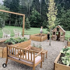 children are playing in the backyard garden with wooden benches and raised planters, while an adult looks on