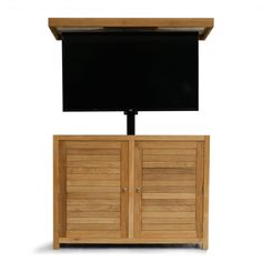 a television on top of a wooden cabinet