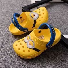 Children'S Croc Shoes Minions Boys And Girls Beach Shoes Slippers Sandals Non-Slip Breathable Slip-on Round Toe Sandals For Beach, Non-slip Jelly Sandals For Spring, Cute Slide Sandals In Eva, Cute Slide Sandals With Eva Material, Non-slip Eva Slide Slippers, Flat Eva Slippers With Rubber Sole, Summer Open Toe Non-slip Clogs, Synthetic Slip-on Flip Flops With Round Toe, Slip-on Sandals With Rubber Sole