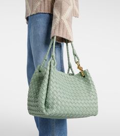 Parachute Large leather shoulder bag in green - Bottega Veneta | Mytheresa Modern Leather Shoulder Bag With Intrecciato Weave, Modern Leather Satchel With Intrecciato Weave, Intrecciato Weave Crossbody Bag For Office, Office Intrecciato Weave Crossbody Bag, Calf Leather Tote Shoulder Bag With Gold-tone Hardware, Office Shoulder Bag With Intrecciato Weave, Intrecciato Weave Satchel Shoulder Bag For Office, Office Shoulder Bag With Intrecciato Weave And Double Handle, Light Luxury Leather Shoulder Bag With Top Handle