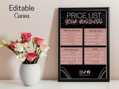 a vase filled with pink and white flowers next to a price list on a wall