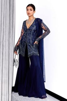 Midnight blue kurta with glass bead, cutdana, sequin embroidery in floral pattern. Paired with flared pant and dupatta. - Aza Fashions Blue Embellished Palazzo Set For Party, Elegant Hand Embellished Palazzo Set For Evening, Elegant Blue Sequined Palazzo Set, Glamorous Blue Embellished Sets, Blue Hand Embellished Sets For Evening, Hand Embellished Blue Evening Sets, Glamorous Blue Sets For Festive Occasions, Glamorous Blue Festive Sets, Blue Embellished Sharara For Party Wear