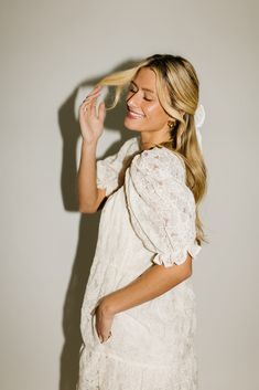 a cream puff sleeve maxi dress that’s flowy, flirty, + fabulous. the perfect maxi dress for any occasion, it has a relaxed silhouette + features lacy puff sleeves + a stretchy scoop neckline. you can dress it up with heels for date nights + dinner parties, or down with sneakers for casual hangs + weekend errands. cream floral // maxi length, sheer lace puff sleeves, elastic cuffs, tiered skirt, elastic scoop neckline, pockets, lined to knee model is 5'8" + wearing a small // 5'8" + wearing a sma Puff Sleeve Maxi Dress, Date Night Dinners, Cream Puff, Date Nights, Cream Puffs, Cream Lace, Tier Skirt, Maxi Dress With Sleeves, Dinner Parties