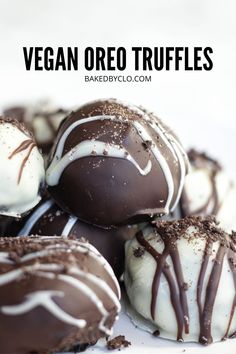 chocolate truffles with white and dark chocolate drizzled on the top