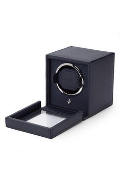 Keep your automatic watch precise and protected with this compact cubic case with perfectly proportioned sides and a single winding module. It's got a clear cover to display your timepiece, chrome hardware and grainy faux-leather exterior. Style Name:Wolf Cub Single Watch Winder. Style Number: 6271928. Modern Formal Watch Accessories With Case, Watch Winder, Cube Design, Chrome Hardware, Diy Kits Gift, Automatic Watch, Blue Leather, Salvatore Ferragamo, Time Piece