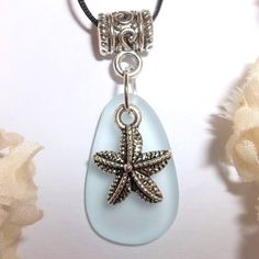 You Are Going To Love Wearing This Cute Little Star Fish Necklace. Brand New And Handmade By Me - Wvluckygirl. Done With A Frosty Turquoise Blue Resin Teardrop That Was Made To "Look Like" Beach Glass. It Has An Antiqued Rustic Silver Toned Starfish Dangling On Top. Pendant And Bail Measure Almost 1 1/2 Inches Tall And 5/8 Inch Wide. It Comes With A 36 Inch Black Nylon Rope Cord String. It Is Adjustable In That You Can Tie It To Any Length You Want To Wear It. You Could Loop It Twice Around Your Bohemian Blue Jewelry With Starfish Charm, Bohemian Blue Starfish Charm Jewelry, Ocean-inspired Blue Jewelry With Star Charm, Turquoise Necklace With Starfish Charm For Beach, Turquoise Necklaces With Starfish Charm For Beach, Beach Turquoise Necklace With Starfish Charm, Blue Star Jewelry For Vacation, Blue Star Shaped Jewelry For Vacation, Silver Starfish Charm Necklace For Summer