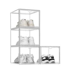 three clear shelves with shoes on them and one white shoe in the bottom right corner