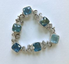 Dalben Aquamarine Diamond Gold Bracelet | From a unique collection of vintage link bracelets at https://www.1stdibs.com/jewelry/bracelets/link-bracelets/