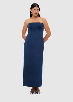 PRODUCT DESCRIPTION Premium textured maxi dressStrapless necklineInvisible side zip closureFitted waistFully lined SIZE & FIT 6 8 10 12 14 16 18 Bust 80 85 90 95 101 107 113 Waist 65 70 75 80 86 92 98 Hip 94 99 104 109 115 121 127 Back length 116 117 118 119 120 120 120 Hem Circumference 87 92 97 102 108 114 120 Amanda is 5’9" (177 cm) and wears a size 8Bust: 31” (82cm) / Waist: 24" (61cm) / Hips: 35” (89cm) Pala is 5’10” (178 cm) and wears a size 12Bust: 39” (99cm) / Waist: 31” (78cm) / Hips: 4 Tara Milk Tea, Leo Lin, Maxi Dress Navy, Denim And Lace, New Arrival Dress, Ladies Day, Skirt Pants, Side Zip, Jumpsuit Dress