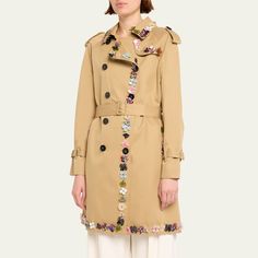 Libertine "Button Town" belted trench coat features multicolor buttons throughout the trim  Spread collar  Two-row button front  Long sleeves; belted shoulders and cuffs  Adjustable belted waist  Side slip pockets  Mid-length  Relaxed fit  Cotton Lining: Polyester Dry clean Made in USA Designer Spring Outerwear With Belted Cuffs, Wardrobe Sale, Evening Flats, Cocktail Jacket, Belted Trench Coat, Spring Wardrobe, Lingerie Sleepwear, Designer Collection, Coat Dress