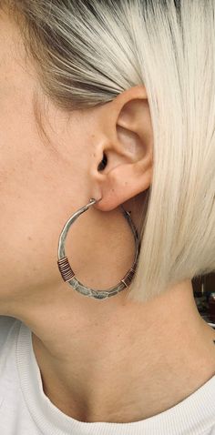 "Substantial 10 gauge solid Sterling silver has been hammered into 2\" big hoops and wrapped with genuine copper. ** listing is for ONE pair of hoops Despite their thickness, these earrings are lightweight and easy on the ear. 20 gauge Sterling earwires. Too small? I offer a larger version here: https://etsy.me/2JukcGm Handmade in NY PLEASE NOTE: For sanitary and hygienic reasons, all earring sales are FINAL. ALL unauthorized returns will be subject to a 25% restock fee. Every item comes careful Everyday Hammered Metal Hoop Earrings, Small Hammered Metal Hoop Earrings, Hammered Metal Hoop Jewelry, Adjustable Hammered Hoop Earrings, Adjustable Metal Hoop Wrap Earrings, Small Hoop Hammered Metal Earrings, Everyday Metal Hoop Earrings With Oxidized Finish, Adjustable Hand Forged Metal Hoop Earrings, Hammered Metal Circle Hoop Earrings