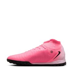 the nike vapor soccer shoe is bright pink and has black accents on the upper part