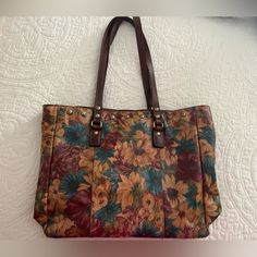 Beautiful Bag Gently Used Leather Shoulder Bag With Floral Print For Travel, Travel Floral Print Leather Shoulder Bag, Leather Bags With Floral Print For Shopping, Leather Floral Print Satchel Shoulder Bag, Leather Floral Print Shoulder Bag For Travel, Everyday Brown Shoulder Bag With Floral Print, Multicolor Floral Print Shoulder Bag For Daily Use, Daily Use Multicolor Floral Print Shoulder Bag, Leather Tote Bag With Floral Print