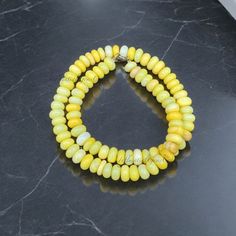 Gemstone Name: Yellow Opal Beads Size: 8mm-9mm Approx.  Beads Shape: Smooth Rondelle Material: Gemstone, 925 Sterling Silver Closure: Lobster Clasp Length: 18" Inch Handmade: Yes 8mm Rondelle Beads For Jewelry Making, Yellow Faceted Beaded Necklace, Yellow Faceted Beads Round Necklace, Yellow Faceted Beads Beaded Necklace, Yellow Faceted Beaded Necklaces, Yellow Faceted Beads Necklace, Yellow Beaded Gemstone Bracelets, Yellow Gemstone Beaded Bracelets, Yellow Gemstone Beads Bracelet