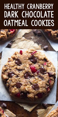 healthy cranberry dark chocolate oatmeal cookies on parchment paper with text overlay