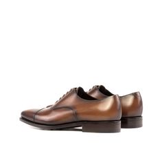 Characterized by its closed lacing style, the oxford is an elegant, classic, timeless style suitable for any occasion. The oxford is a staple shoe in any man’s wardrobe and can be dressed up or down. The Details: *Burnished Materials: med brown box calf Sole: brown goodyear leather sole + buttons rubber injections Last: Monti - Classic elegance with slightly square toe What is Fast Lane? Fast lane is our new experimental 7 day made to order collection, an ambitious never been heard of before col Men's Oxford Shoes, Brown City, Staple Shoes, Custom Made Shoes, Oxford Shoes Men, Brown Box, Goodyear Welt, Shoes Leather, Black Laces