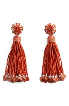 Raffia-topped tassels strung with colorful glass beads swing and sway with every movement of your head when wearing these statement earrings. Stainless steel post back Glass/acrylic/raffia/metal Imported Tassel Drop Earrings, Steel Post, Beaded Tassels, Your Head, Colored Glass, Statement Earrings, Beaded Jewelry, Tassels, Glass Beads