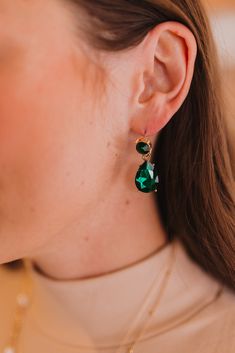 Features a teardrop emerald green drop earring. Such a great statement earring to add color to any outfit! -Length: 1.25" -Post back Green Drop Crystal Earrings For Party, Elegant Green Teardrop Earring (single), Green Pear-shaped Earrings For Party, Elegant Green Teardrop Single Earring, May Birthstone Teardrop Jewelry For Parties, Green Dangle Teardrop Earrings For Party, Green Emerald Teardrop Earrings, Elegant Green Teardrop Crystal Earrings, Pear-shaped Emerald Green Earrings