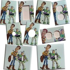 six toy story light switch plates with woody and buzz the spaceman characters on them