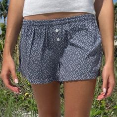 Brandy Melville Keira Floral Pajama Shorts Size Xs/S Brand New And Nwt Pajama Shorts With An Elastic Waistband And Button Down Detailing. Fabrics: 100% Polyester Measurement: 8" (20cm) Rise, 2.5" (6cm) Inseam, 26" (66cm)Waist (Stretches) Cotton Sleepwear With Built-in Shorts, Summer Vacation Sleepwear With Built-in Shorts, Summer Cotton Pajama Shorts For Pajama Party, Casual Sleepwear With Built-in Shorts, Cotton Pajama Shorts For Summer Pajama Party, Summer Cotton Sleepwear With Elastic Waistband, Comfortable Cotton Sleepwear For Vacation, Blue Relaxed Fit Sleepwear With Elastic Waistband, Cotton Sleepwear With Elastic Waistband, Short Length