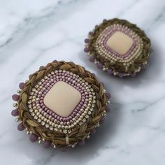 Indigenous made purple and champagne stud earrings with sweetgrass braid. Elegant Handmade Purple Clip-on Earrings, Elegant Handmade Lavender Beaded Earrings, Purple Handwoven Earrings As A Gift, Artisan Purple Round Bead Earrings, Artisan Purple Round Beaded Earrings, Round Woven Earrings Ideal For Gifts, Round Woven Earrings For Gift, Handmade Purple Drop Clip-on Earrings, Round Woven Earrings