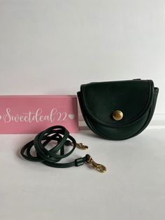 "Classic Vtg Coach Mini Belt/crossbody bag Green leather with brass hardware Small interior with inner slip pocket, outer slip pocket covered by a flap and secured with a snap button closure Detachable 46\" strap to be worn over shoulder or crossbody Measures: 5 1/2\"L, 5\"H, 2\"W Belt loops to attach to your belt as a fanny pack to be hands free Great for cards/ lipstick and small items Made in the United States #1295-337 Cleaned, conditioned and ready to wear! Questions? Just ask More vtg coac Crossbody Saddle Bag With Brass Hardware For Travel, Classic Crossbody Belt Bag For Everyday, Crossbody Flap Bag With Brass Hardware For Travel, Travel Crossbody Flap Bag With Brass Hardware, Travel Belt Bag With Gold-tone Hardware, Travel Shoulder Belt Bag With Gold-tone Hardware, Brass Hardware Crossbody Flap Bag For Travel, Gold-tone Hardware Belt Bag For Travel, Classic Crossbody Belt Bag With Removable Pouch