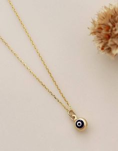 "14k Solid Gold Evil Eye Necklace - 14k Gold Nazar Necklace - Tiny Evil Eye Pendant - Fine Jewelry - Birthday Gift The Solid Gold Evil Eye Necklace \"Protection\" for Women is composed of high-quality 14 Karat Gold. The evil eye figure is the most preferred amulet for eliminating bad energy. Destroying the effects of bad looks, it offers a simple yet beautiful detail on your neck. 🔳WARRANTY🔳 *6 Months warranty. *Free Shipping without price limit. *Easy Return and Replacement 30 days after purc 14k Yellow Gold Evil Eye Necklace, 14k Gold Charm Necklace With Evil Eye, 14k Gold Evil Eye Charm Necklace, 14k Gold Round Evil Eye Charm Necklace, 14k Yellow Gold Evil Eye Charm Necklace, 14k Gold Evil Eye Necklace, 14k Gold Evil Eye Round Necklace, Nazar Jewelry, Nazar Necklace