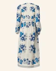 Crafted from cotton voile, our blue-and-white floral print prairie dress has a romantic silhouette and long sleeves. The lightweight meadow dress has a V-neckline, long sleeves, and a gathered skirt. Inspired by vintage Provençal textiles, the Winifred is one of our favorite fits and easy to wear. Spring Floral Print Maxi Prairie Dress, Pastoral Long Sleeve Spring Dresses, Spring Pastoral Long Sleeve Dresses, Pastoral Long Sleeve Dresses For Spring, Pastoral Prairie Dress For Spring Garden Party, Spring Pastoral Prairie Dress For Garden Party, Spring Peasant Midi Dress With Long Sleeves, Pastoral Prairie Dress With Floral Print, Long Sleeve Prairie Dress For Summer Garden Party