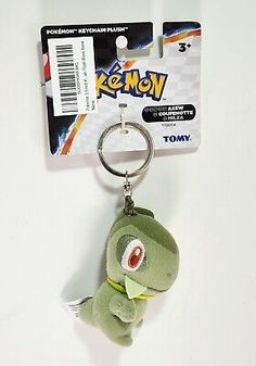 a keychain with a pokemon stuffed animal hanging from it's front end